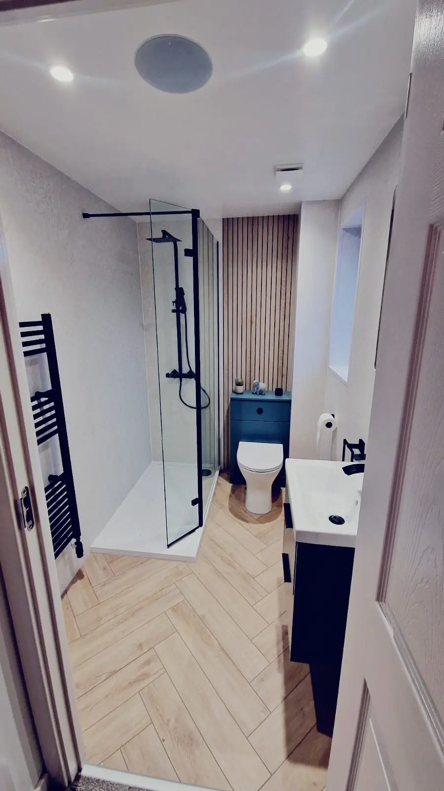 Small bathroom specialist Edinburgh with herringbone floor